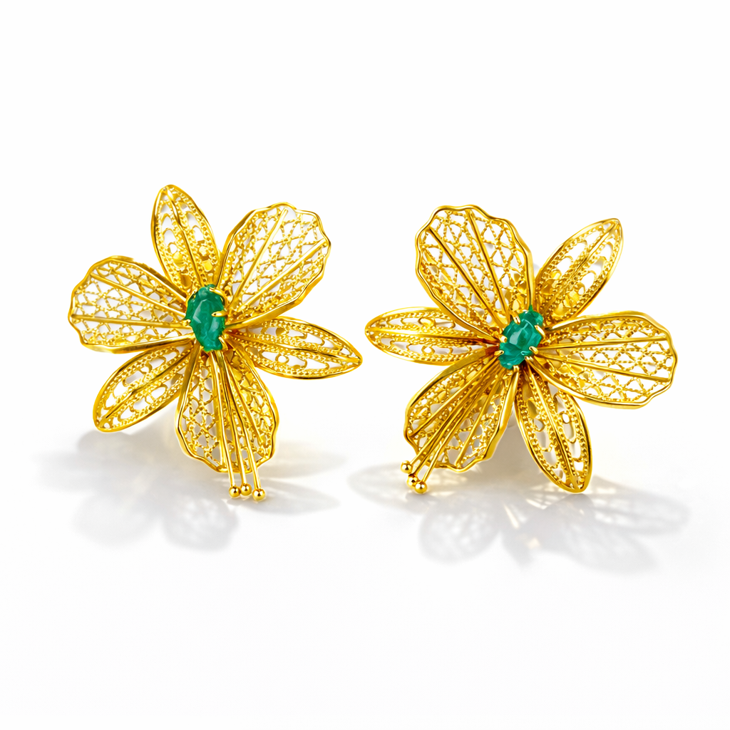 Handcrafted Colombian orchid earrings with emerald accents and 24K gold-plated bronze and copper filigree