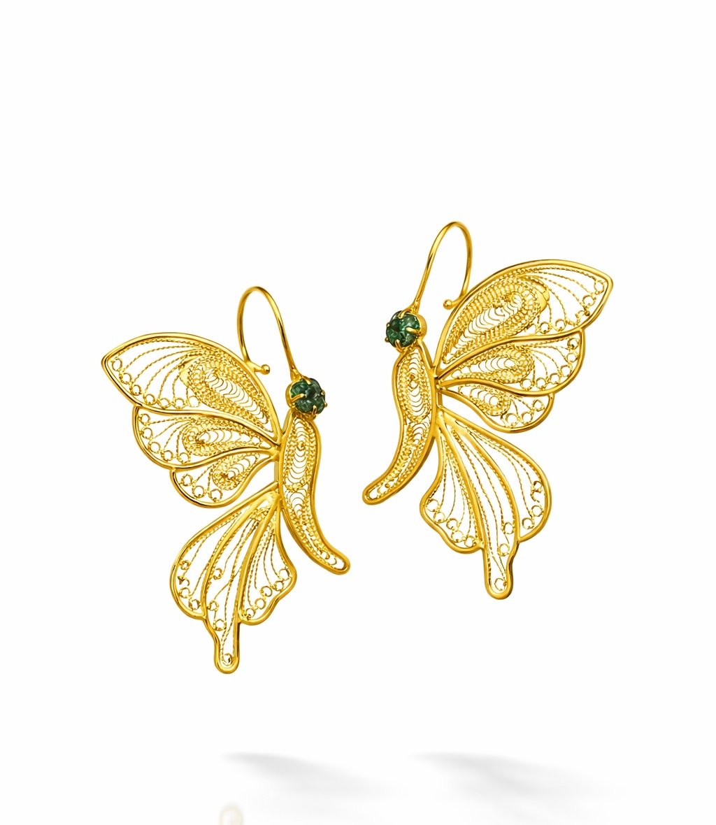 Handcrafted butterfly earrings with emerald accents and 24K gold-plated bronze filigree